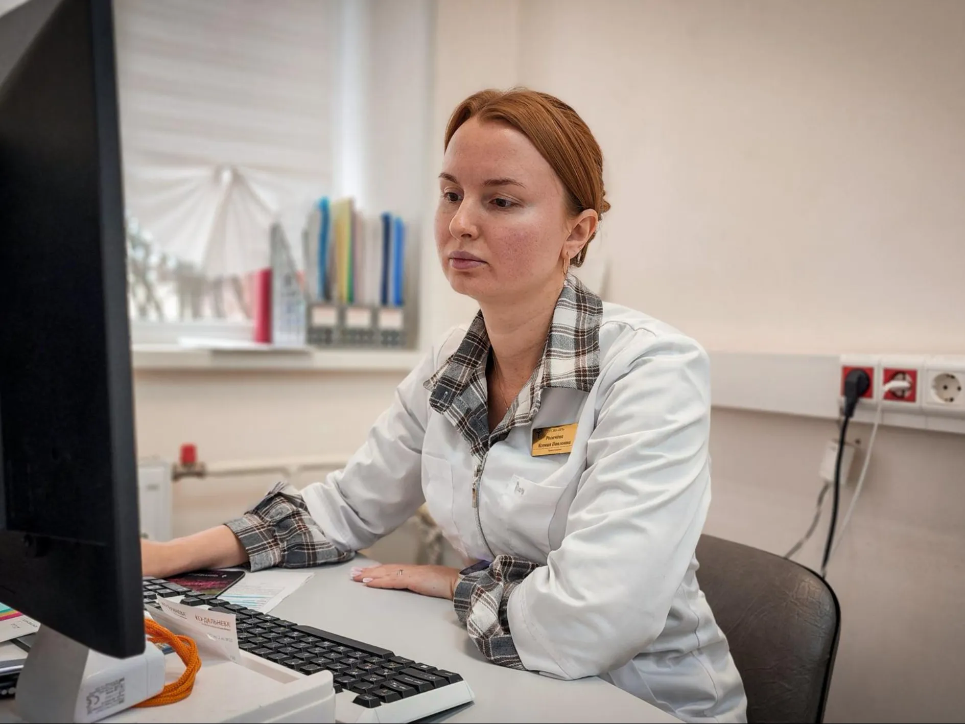 Ксения Рогачева, исполняющая обязанности заведующей терапевтическим отделением поликлиники, врач-терапевт. Фото: МедиаБанк Подмосковья/Ольга Антонова