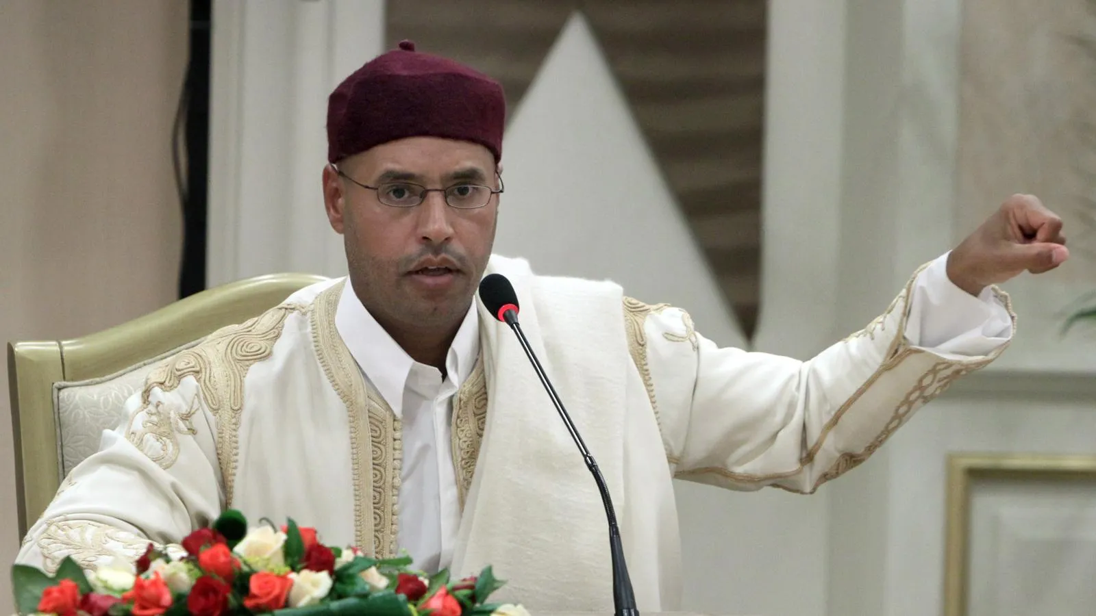 Саиф аль-Ислам Каддафи. Cai Yang