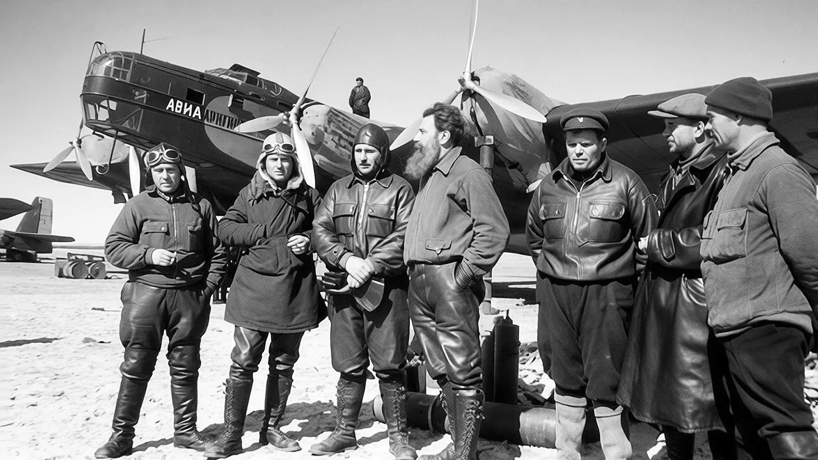 Экспедиция «Северный полюс-1», слева направо: Иван Спирин, Марк Шевелев, Михаил Бабушкин, Отто Шмидт, Михаил Водопьянов, Анатолий Алексеев и Василий Молоков, 1937 год