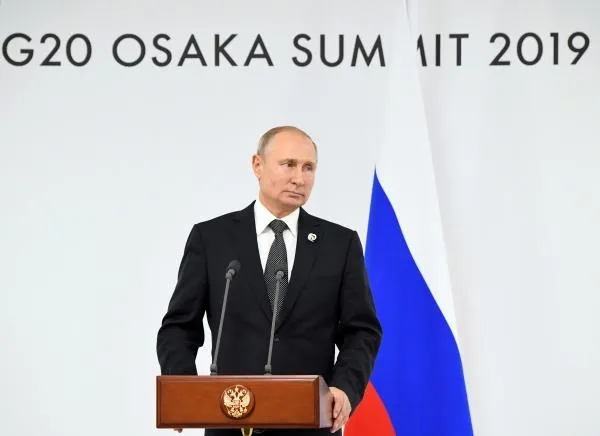 Владимир Путин на пресс-конференции по итогам саммита «Группы двадцати» в международном выставочном центре INTEX Osaka, 2019 год