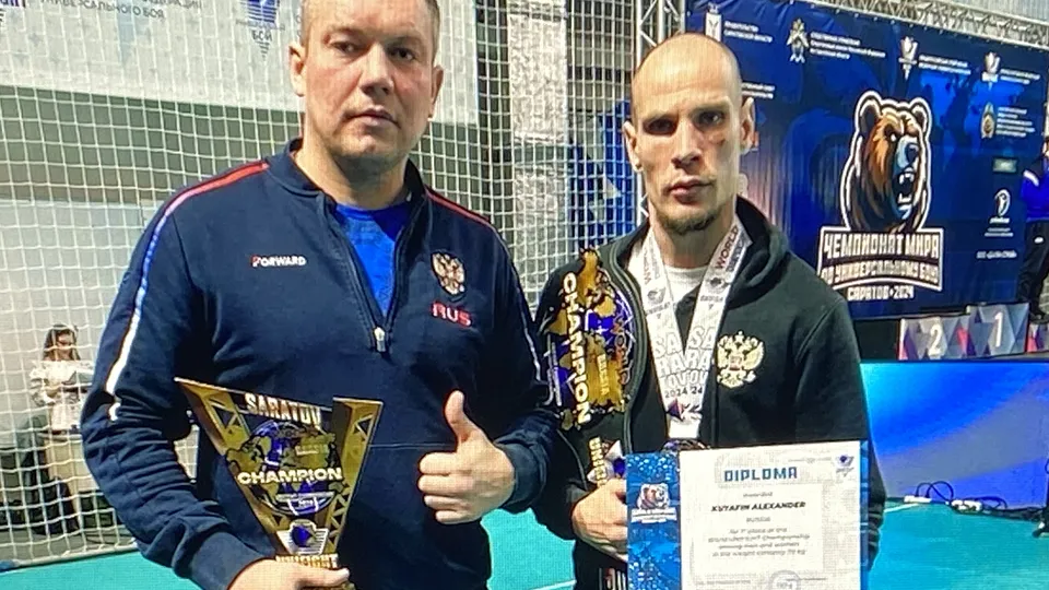 Александр Кутафин (справа) и его тренер Алексей Гуреев. Фото: REGIONS