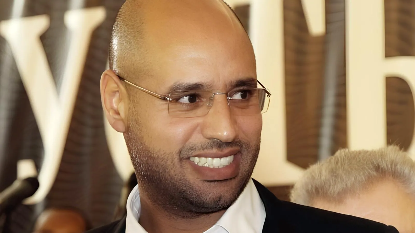 Саиф аль-Ислам Каддафи на выставке в «Новом Манеже». Владимир Федоренко